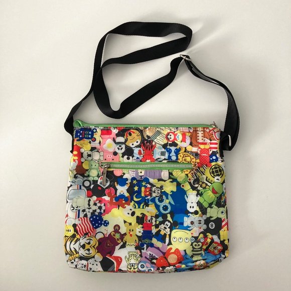 Disney Parks Vinylmation Crossbody Bag - 2 Outside Pockets & 1 Inside Zip Pocket - Picture 1 of 10